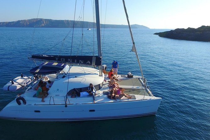 Santorini Full Day Catamaran Private Cruise incl. Meal, Drinks & Free Transport - What the Crew and Boat Time Are Like
