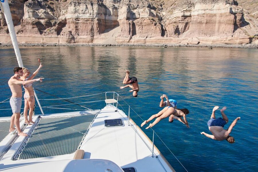 Santorini Gold Catamaran Cruise with Snorkel, BBQ & Open Bar - Why Santorini looks better from a catamaran