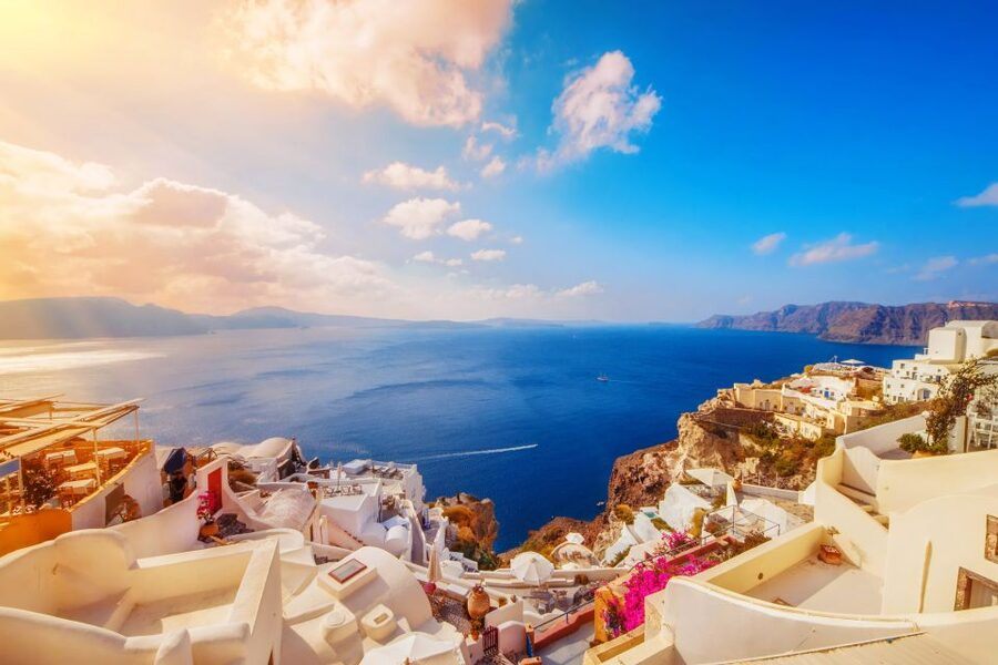 Santorini: Guided Island Day Trip with Beach Visit - Fira combines food, photographs, and a cliffside setting