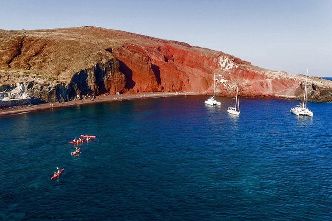 Santorini Guided Sea Kayaking with Light Lunch and Pick-up Option - A Traditional Taverna Lunch