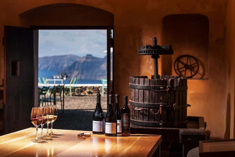 Santorini: Guided Wine Tour with Pickup and Snacks - Leaving Thera for Estate Argyros