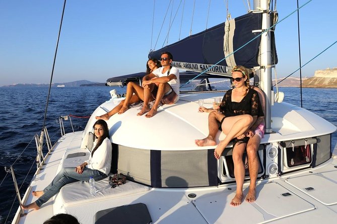 Santorini Half Day Catamaran Private Cruise incl. Meal, Drinks & Free Transport - Why see Santorini from a catamaran?