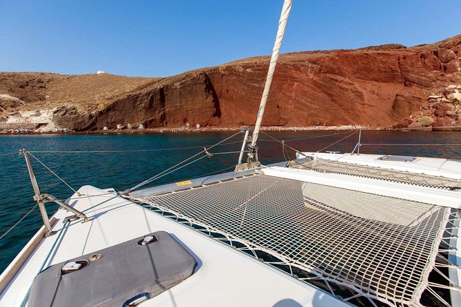 Santorini Half Day Catamaran Private Cruise incl. Meal, Drinks & Free Transport - A long stop at Mesa Pigadia