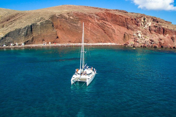 Santorini Half Day Catamaran Private Cruise incl. Meal, Drinks & Free Transport - Starting at Vlychada Port