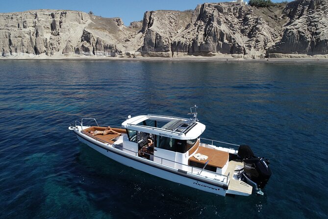 Santorini Half Day MotorCruiser Private Cruise incl. Meal,Drinks &Free Transport - Aspronisi and the volcanic story beneath the water