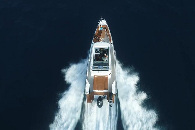 Santorini Half Day MotorCruiser Private Cruise incl. Meal,Drinks &Free Transport - Oia, Imerovigli, and Firostefani from the sea