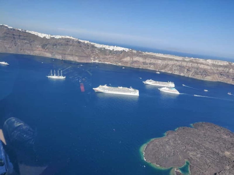 Santorini: Helicopter Sightseeing Flight Over Caldera - Safety briefing and boarding at the heliport