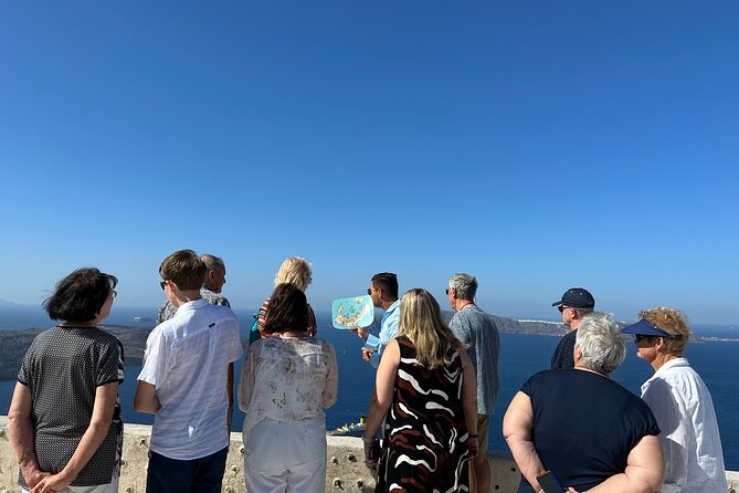 Santorini in 5 hours: Oia, Traditional Villages & Black Beach - Finikia offers a quieter look toward Oia
