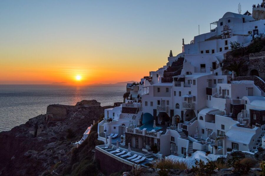Santorini Island Bus Tour and Caldera Sunset Cruise - Palea Kameni offers a short sulfur-water swim