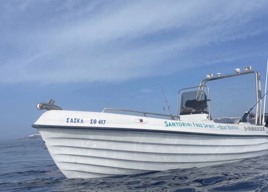 Santorini: License-Free Boat Rental with Snorkeling Gear - Seeing Santorini from below the cliffs