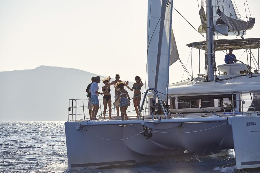 Santorini: Luxurious Catamaran Cruise with Meal & Open Bar - Sunset from the sea changes the mood