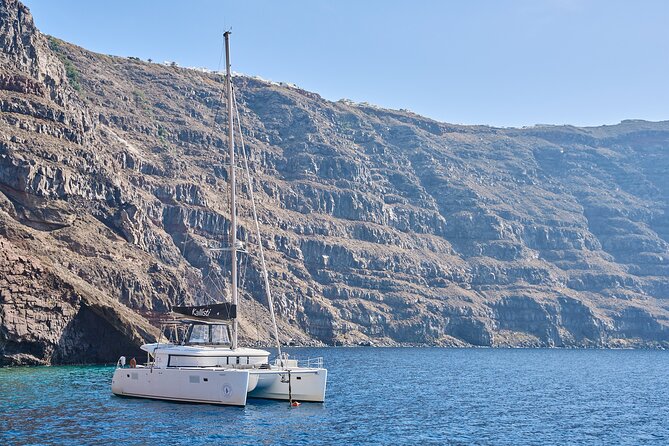 Santorini: Luxury Catamaran Cruise with Fresh Fish BBQ & Drinks - Pickup from Imerovigli and the start of the day