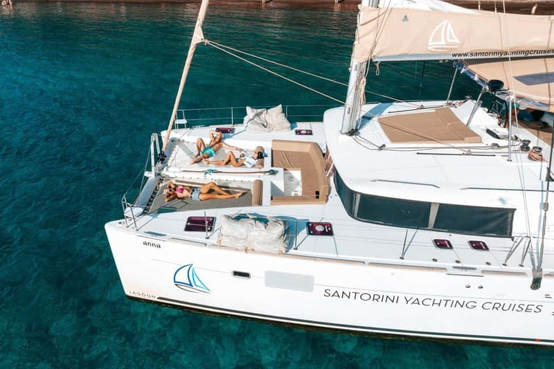 Santorini: Luxury Catamaran Cruise with Lunch, BBQ & Drinks - Red Beach and White Beach from the water