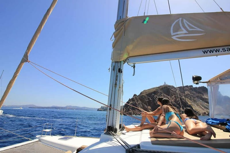 Santorini: Luxury Catamaran Cruise with Lunch, BBQ & Drinks - Thirasia combines swimming with lunch