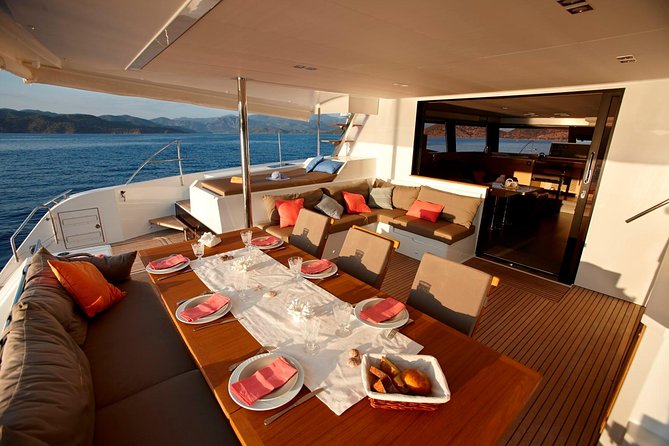 Santorini Luxury Catamaran Day Cruise with BBQ,drinks,transfer - Swimming at the Hot Springs