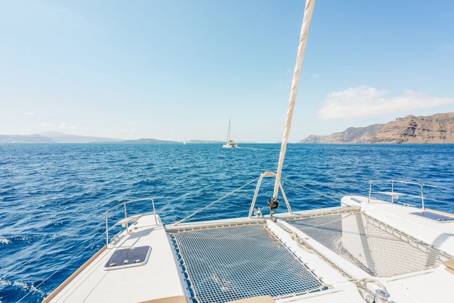 Santorini: Luxury Catamaran Day Trip with Meal and Open Bar - Red Beach and White Beach swim stops