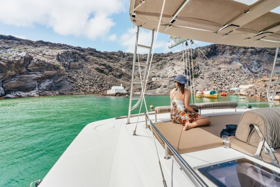 Santorini: Luxury Catamaran Day Trip with Meal and Open Bar - Sailing past Santorini’s caldera landmarks