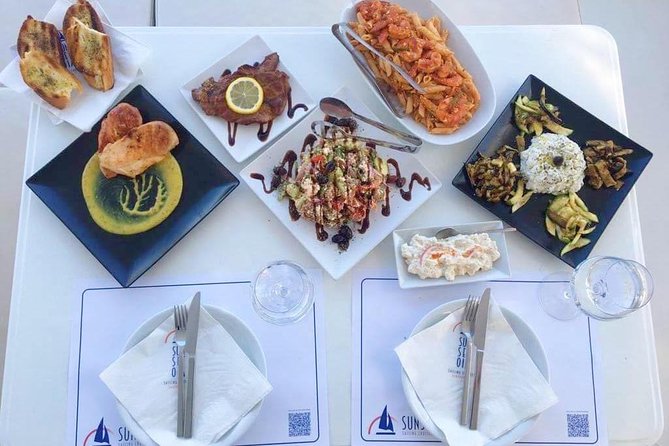 Santorini Luxury Catamaran Sunset Cruise with BBQ, Drink and Transfer - Sailing beside the volcano