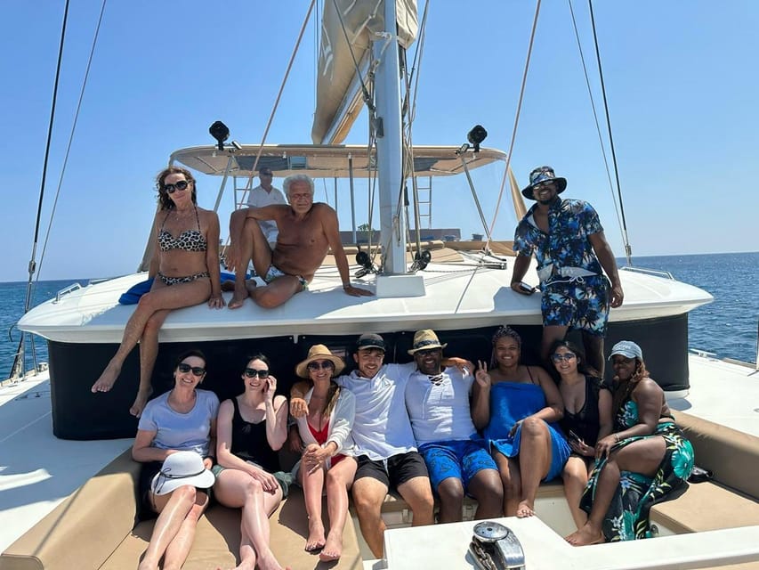 Santorini: Luxury Sunset Cruise with Dinner, BBQ, and Drinks - What to pack for a comfortable five hours
