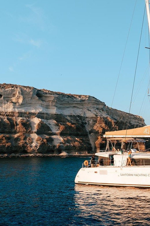 Santorini: Luxury Sunset Cruise with Dinner, BBQ, and Drinks - Entering the caldera and the hot springs at Palea Kameni