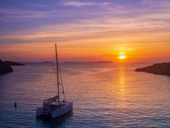 Santorini: Luxury Sunset Cruise with Dinner, BBQ, and Drinks - From Vlychada Port past Santorini’s colorful coast
