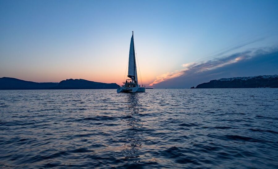 Santorini: Luxury Sunset Cruise with Dinner & Open Bar - The volcanic islands and hot springs