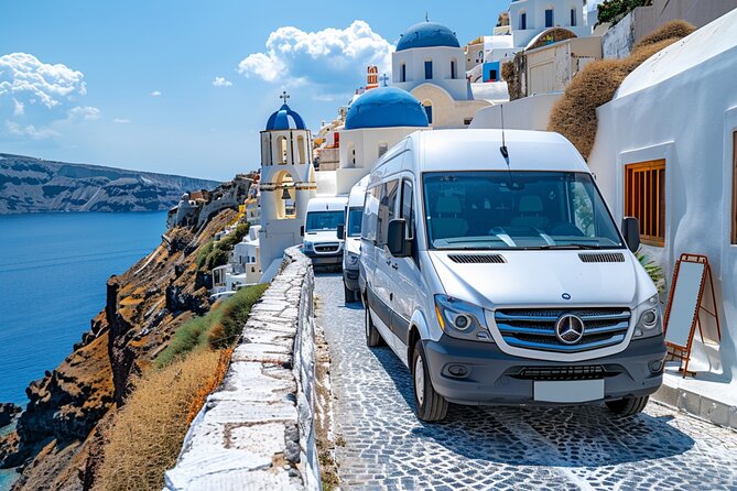 Santorini: Main Port Shared Shuttle - Bus to Hotels or Airport - The drivers and small touches
