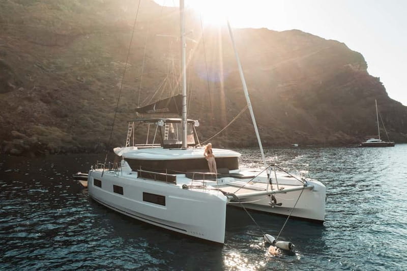 Santorini: Majestic Catamaran Cruise with Meal and Drinks - Thirassia Island and Manolas village from the sea