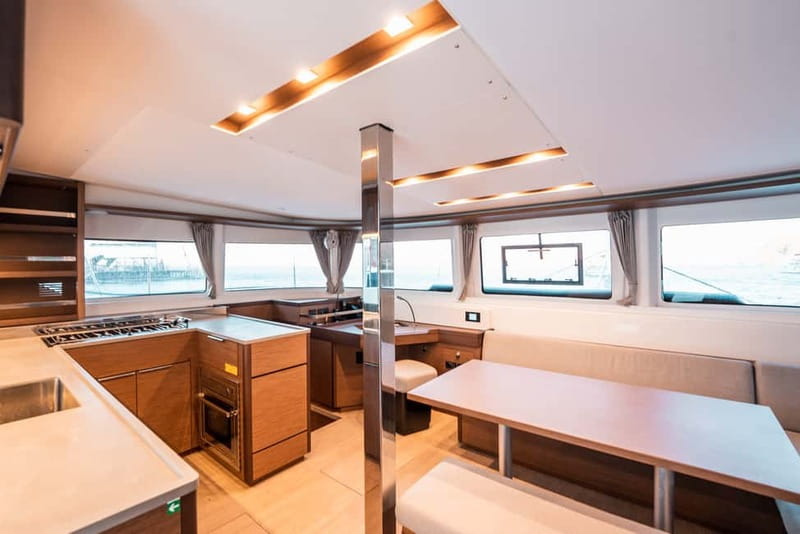 Santorini: Majestic Catamaran Cruise with Meal and Drinks - Red, White, and Black volcanic shores