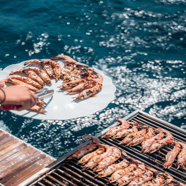 Santorini: Majestic Catamaran Cruise with Meal and Drinks - What the swimming setup is like