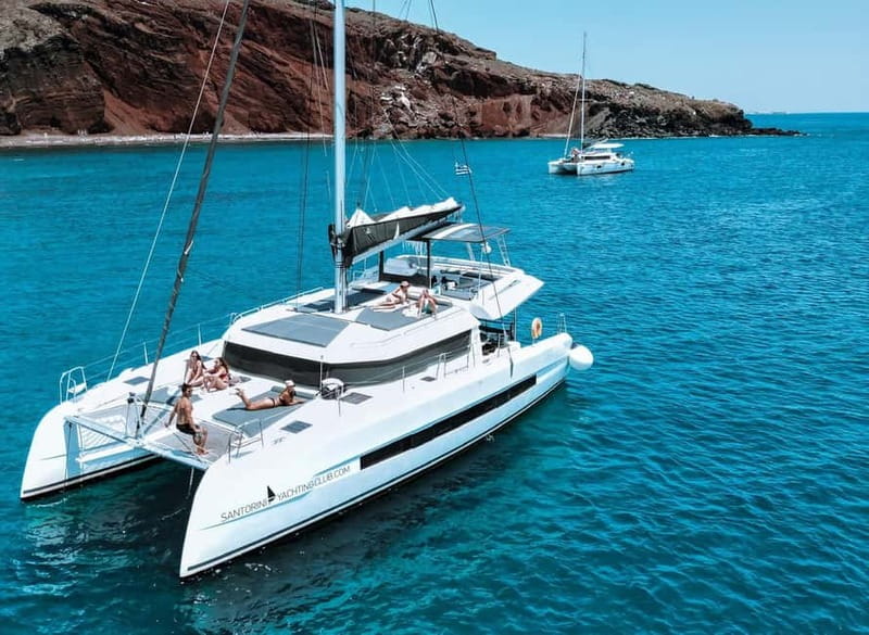 Santorini: Majestic Catamaran Cruise with Meal and Drinks - Choosing between the day and sunset departures