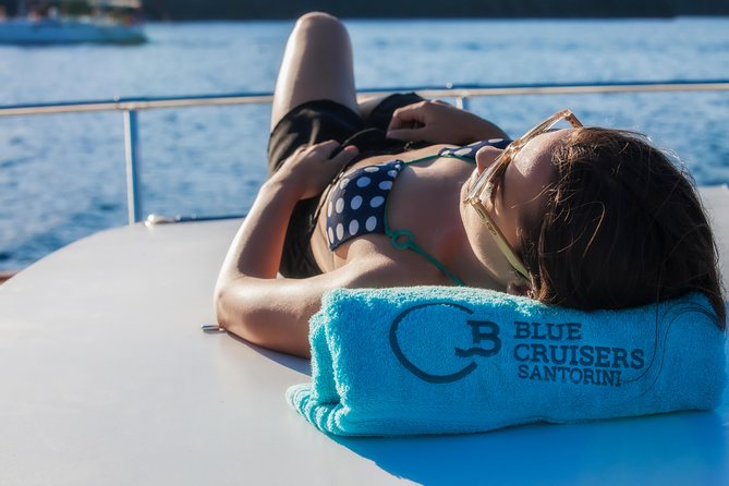 Santorini: Motor Yacht Sunset Cruise with 5-Course Dinner - The sunset from the Aegean, not from Oia