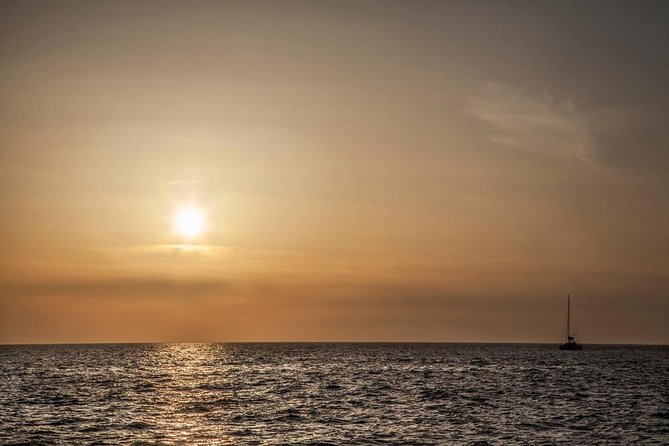 Santorini: Motor Yacht Sunset Cruise with 5-Course Dinner - Crew service and the feel onboard