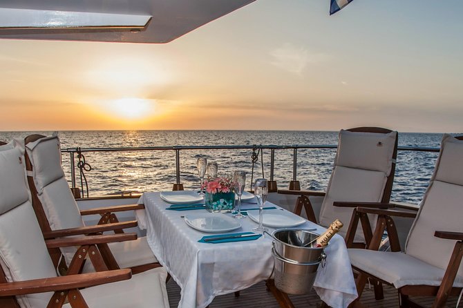 Santorini: Motor Yacht Sunset Cruise with 5-Course Dinner - Practical details that affect your choice