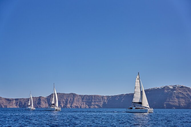 Santorini Oia: Caldera Luxury Day Cruise with BBQ & Drinks - The volcanic waters of Nea Kameni