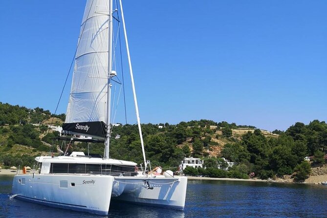 Santorini Oia: Private Sunset Catamaran Cruise with BBQ & Drinks - Thirassia offers a quieter first swim