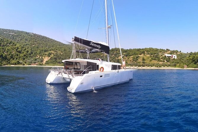 Santorini Oia: Private Sunset Catamaran Cruise with BBQ & Drinks - Red Beach combines scenery and dinner