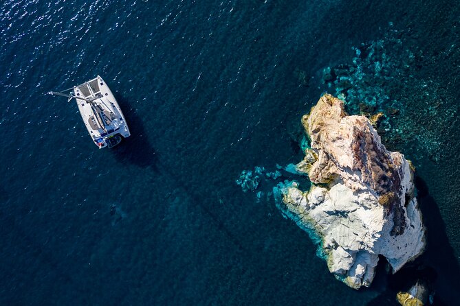 Santorini Platinum Catamaran Cruise with Meal, BBQ and Open Bar - Why seeing Santorini from the sea matters