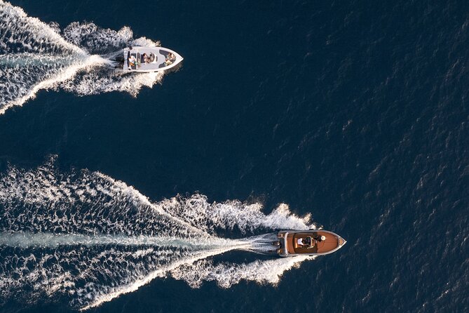Santorini Private Adventure – Captain Your Own Cruise - Taking the wheel at Vlychada