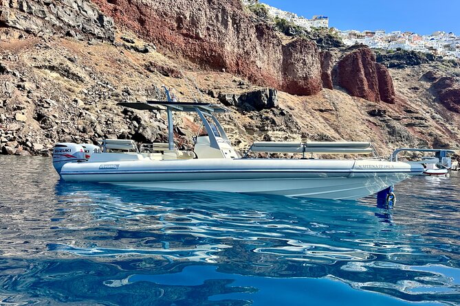 Santorini private boat tour - Santorini Volcano, the first major stop