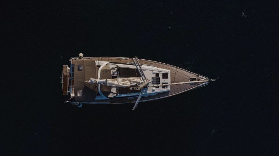 Santorini: Private Caldera Sailing Trip with Open Bar & Meal - White Beach offers a better photo stop