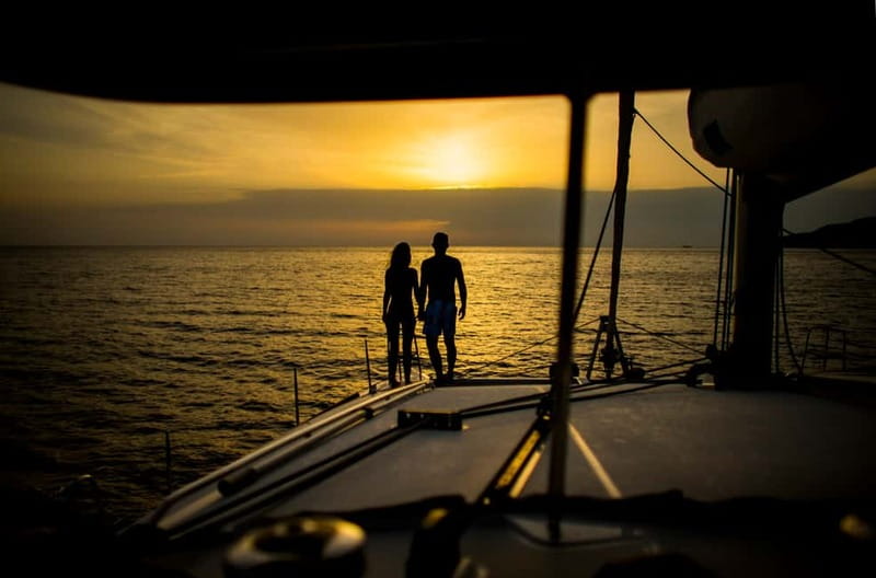 Santorini: Private Catamaran Cruise with BBQ Meal and Drinks - Swimming, snorkeling, and quiet time on deck