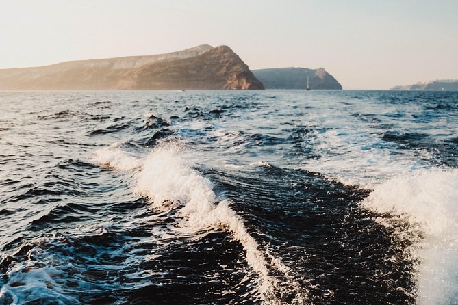 Santorini Private Catamaran Cruise with BBQ, Open Bar & Transfers - White Beach and Mesa Pigadia for swimming