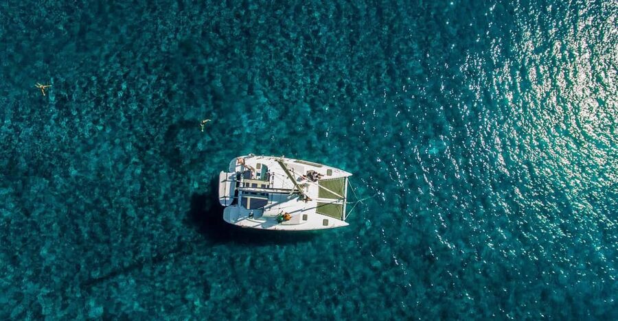Santorini: Private Catamaran Cruise with Food & Drinks - Morning cruise or afternoon sunset sailing