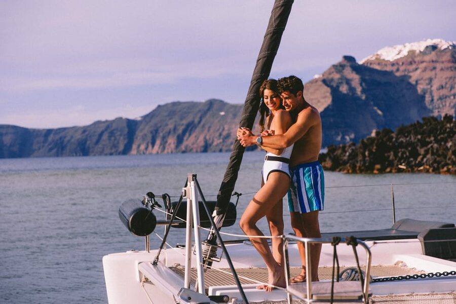 Santorini: Private Catamaran Tour with BBQ Meal and Drinks - Why seeing Santorini from the water matters
