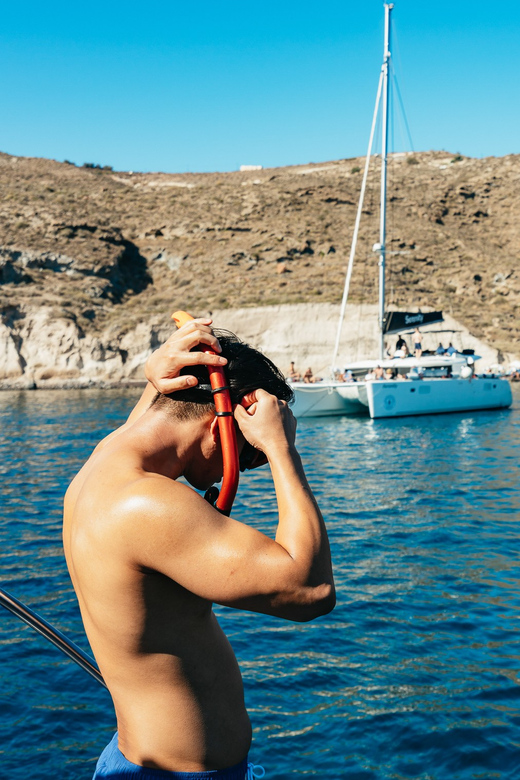 Santorini: Private Catamaran Tour with BBQ Meal and Drinks - Mesa Pigadia and the first swim