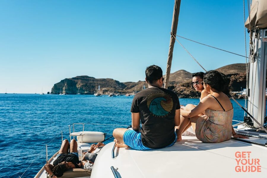 Santorini: Private Catamaran Tour with BBQ Meal and Drinks - Indian Rocks and the Venetian Lighthouse