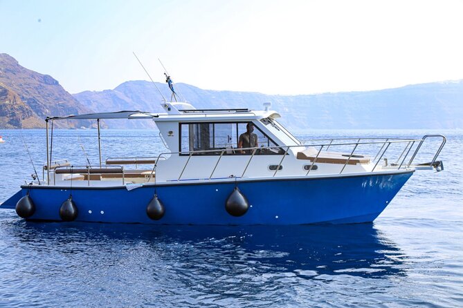 Santorini Private Cruise Sightseeing Tour with BBQ and Drinks - Captain Makis, Elias, and the local point of view