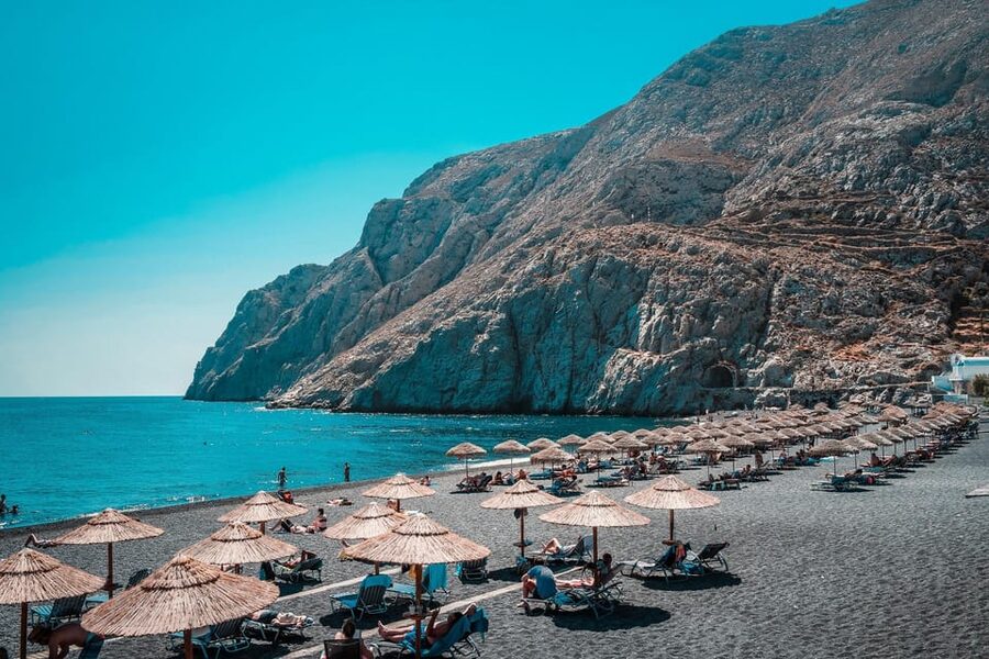 Santorini: Private Customizable Tour with Flexible Lenghts - Black sand, red rock, and the limits of a beach stop