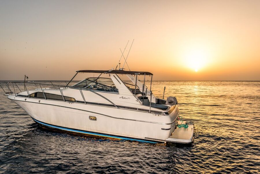 Santorini: Private Day Cruise with Barbeque and Drinks - Oia from the sea, and the choice to stay onboard